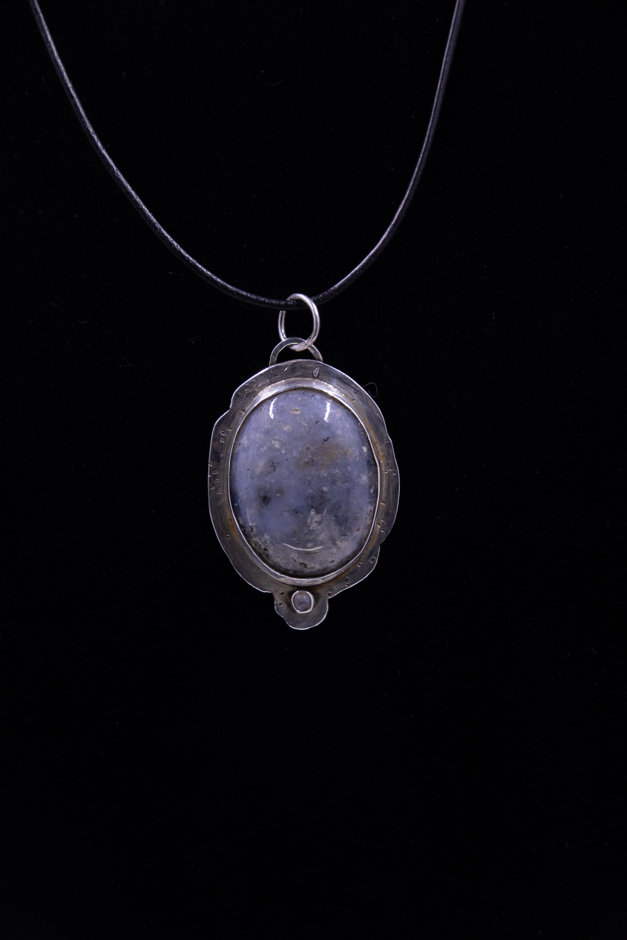 Inclusion Agate Pendant in Set in Sterling Silver