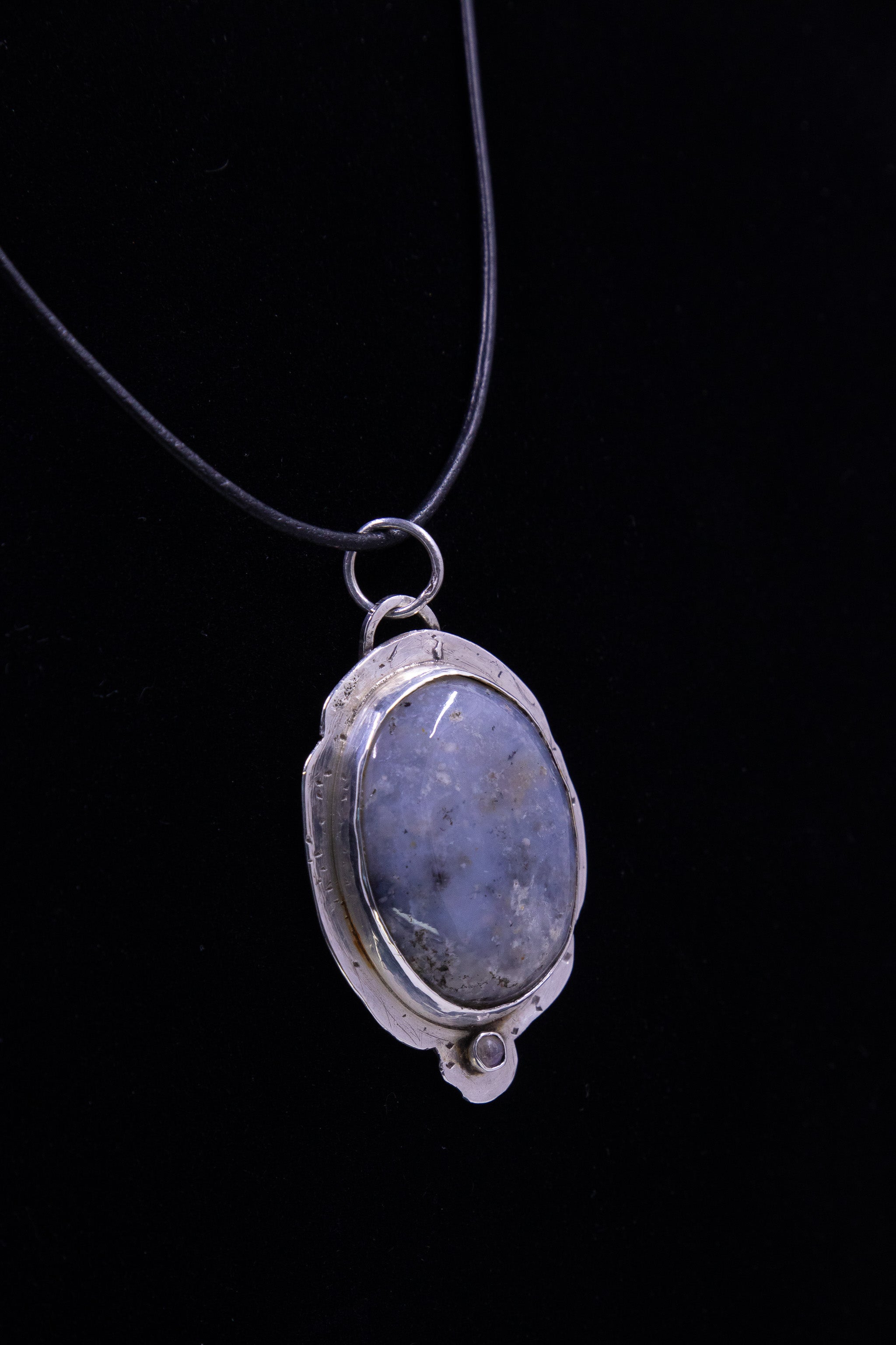 Inclusion Agate Pendant in Set in Sterling Silver