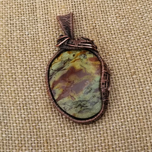 Oregon Green Kaleidoscope Copper Oval Wire Wrap Pendant