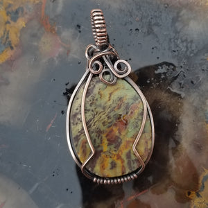 Oregon Green Kaleidoscope Copper Oval Wire Wrap Pendant - One of a kind