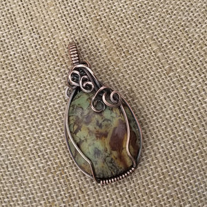 Oregon Green Kaleidoscope Copper Oval Wire Wrap Pendant - One of a kind