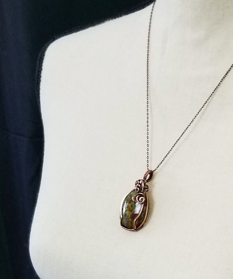 Oregon Green Kaleidoscope Copper Oval Wire Wrap Pendant - One of a kind